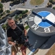Greg Bernstein Rapelling The BMW Headquarters Building in Munich Germany.