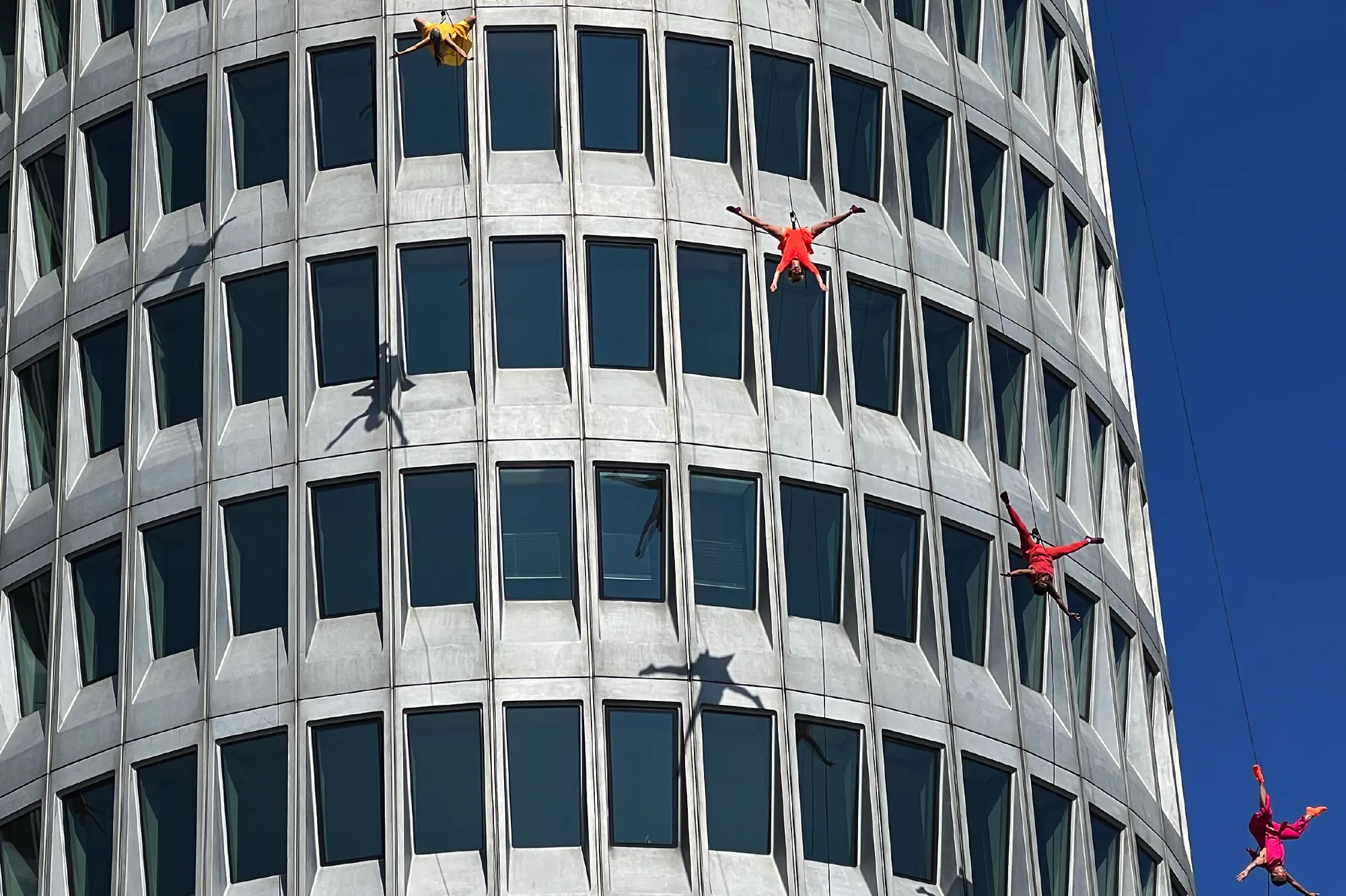 Photography by: Greg Bernstein At the BMW 50-year anniversary in Munich, Bernstein interactively captured the Bandaloop dancers making their way down from the almost 330-foot tall rooftop of the famous 4-Cylinders building, giving gravity and form a new expression.