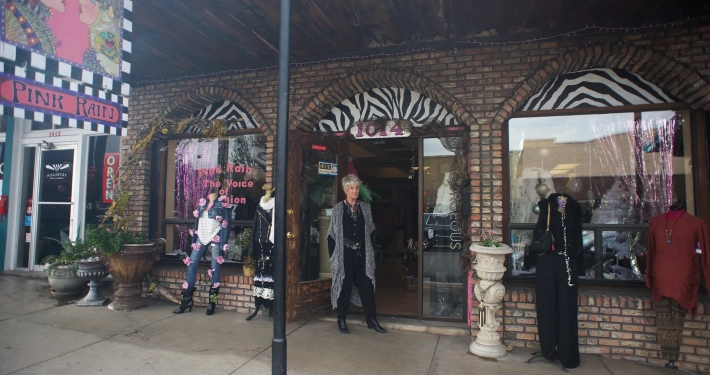 Owner of Christel in front of Pink Rain Boutique in Old Town Cottonwood