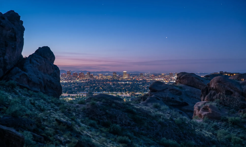View of buildings from the hiking trail at Camelback Mountain in Phoenix at Pre Dawn