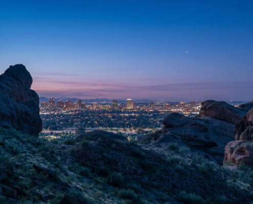 View of buildings from the hiking trail at Camelback Mountain in Phoenix at Pre Dawn